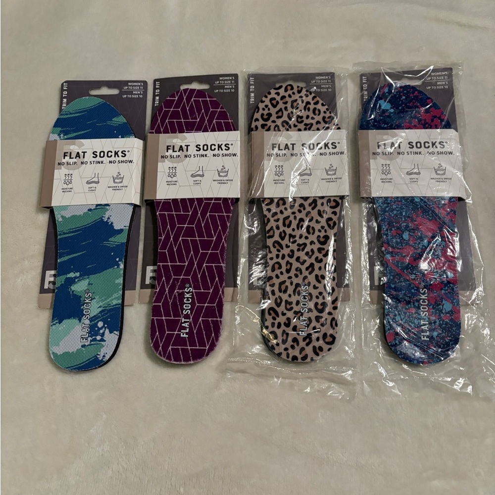 Set of 4 women’s flat socks fits up to size 11 new in the packages